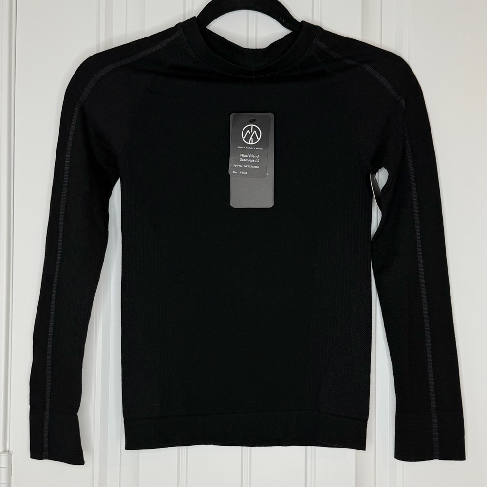 Women’s Move Theology seamless LS wool blend active/modern Top black XS